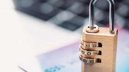 padlock-on-a-credit-card-next-to-a-computer-1168x440px.jpg