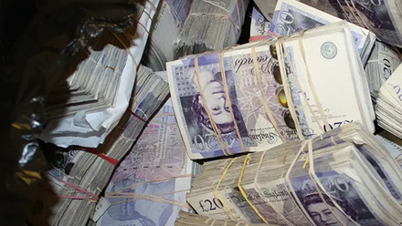 seized-cash-in-black-bag_wikimedia_commons_1080x720px.jpg