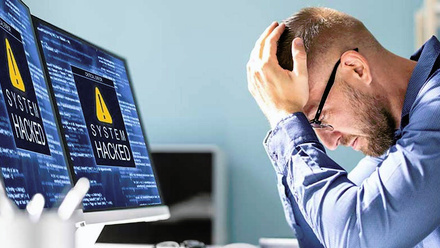 man-suffering-ransomware-attack-1168x440px.jpg