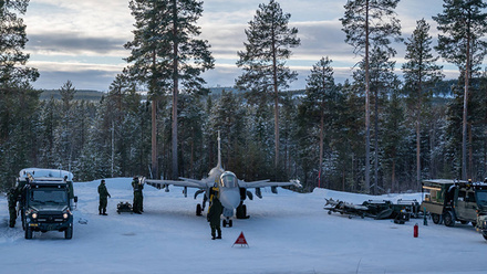 Swedish-conscript-mechanic-re-arm-a-jas-39c-ripen-at-remote-dispersal-airstrip-1168x440.jpg