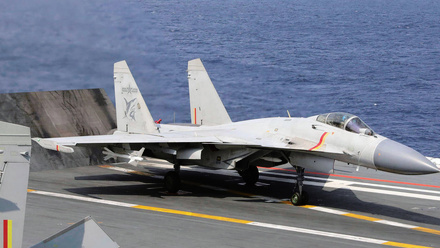 chinese-fighter-jet-on-shandong-aircraft-carrier-1168x440px.jpg 1