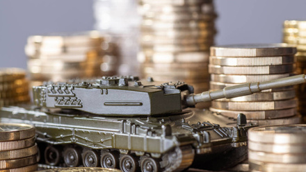 defence-spending-tank-amongst-coins-1080x720.jpg