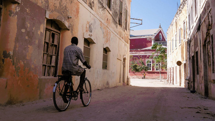 mozambique-man-on-bike-hero-1168-440.jpg